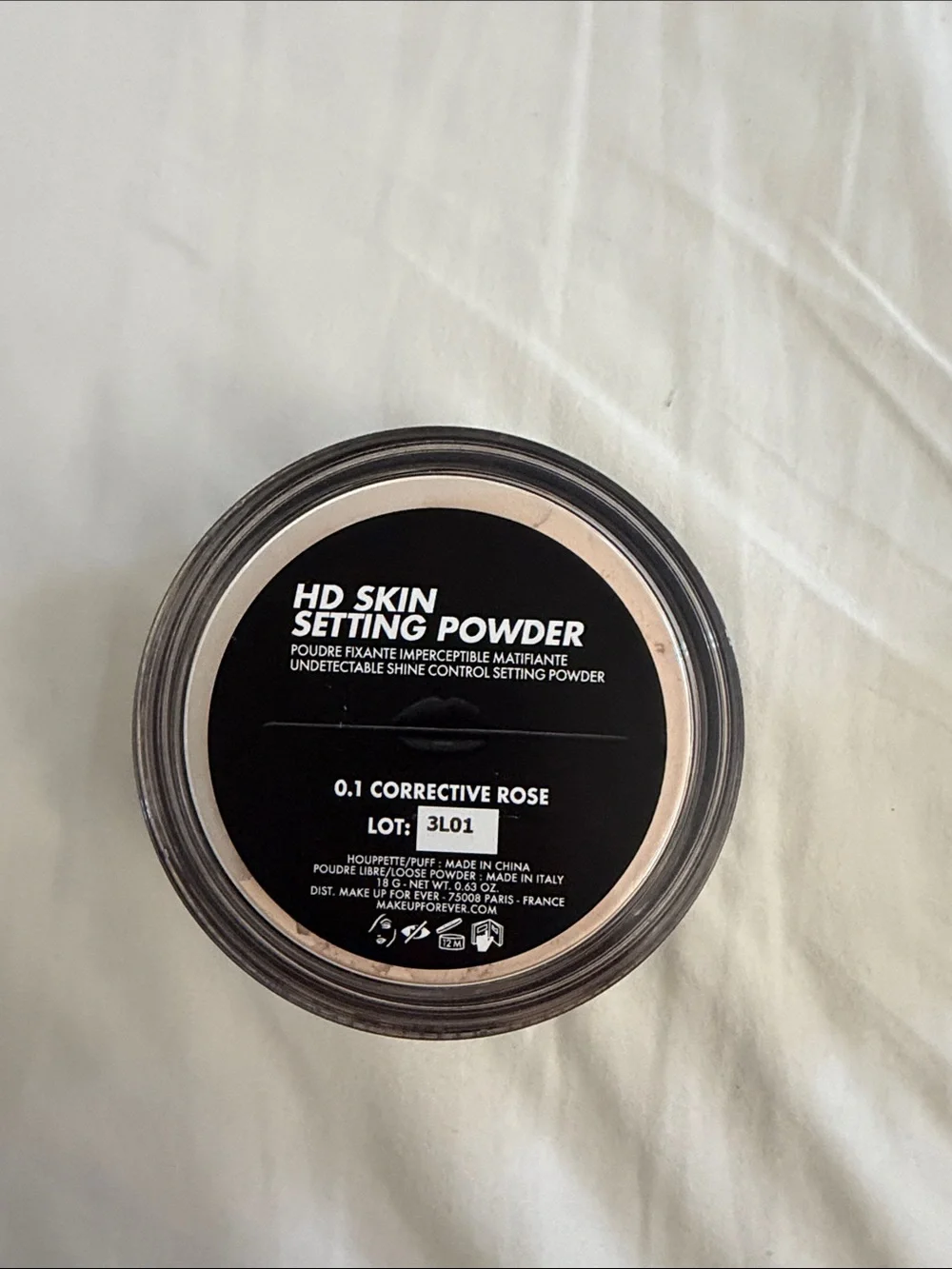 Make Up For Ever HD Skin Setting Powder in shade 0.1 Corrective Rose.